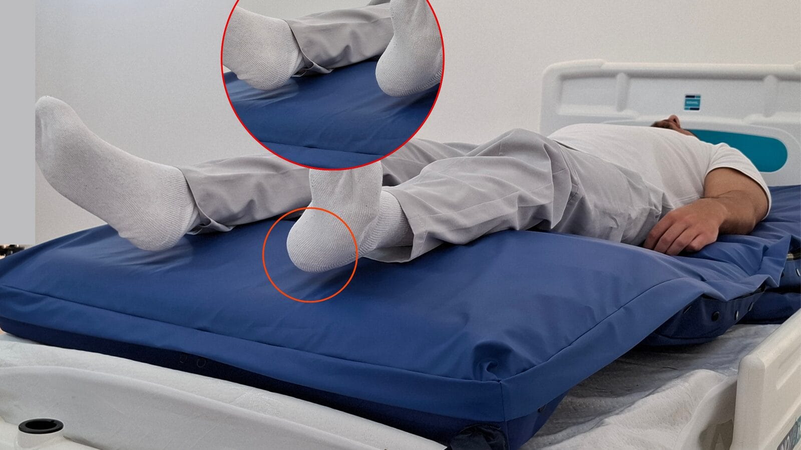 The ABeWER multiTURN 6 Heel Function suspending a patient heel clear of the mattress surface, with the calf supporting the lower limb across a broader area.